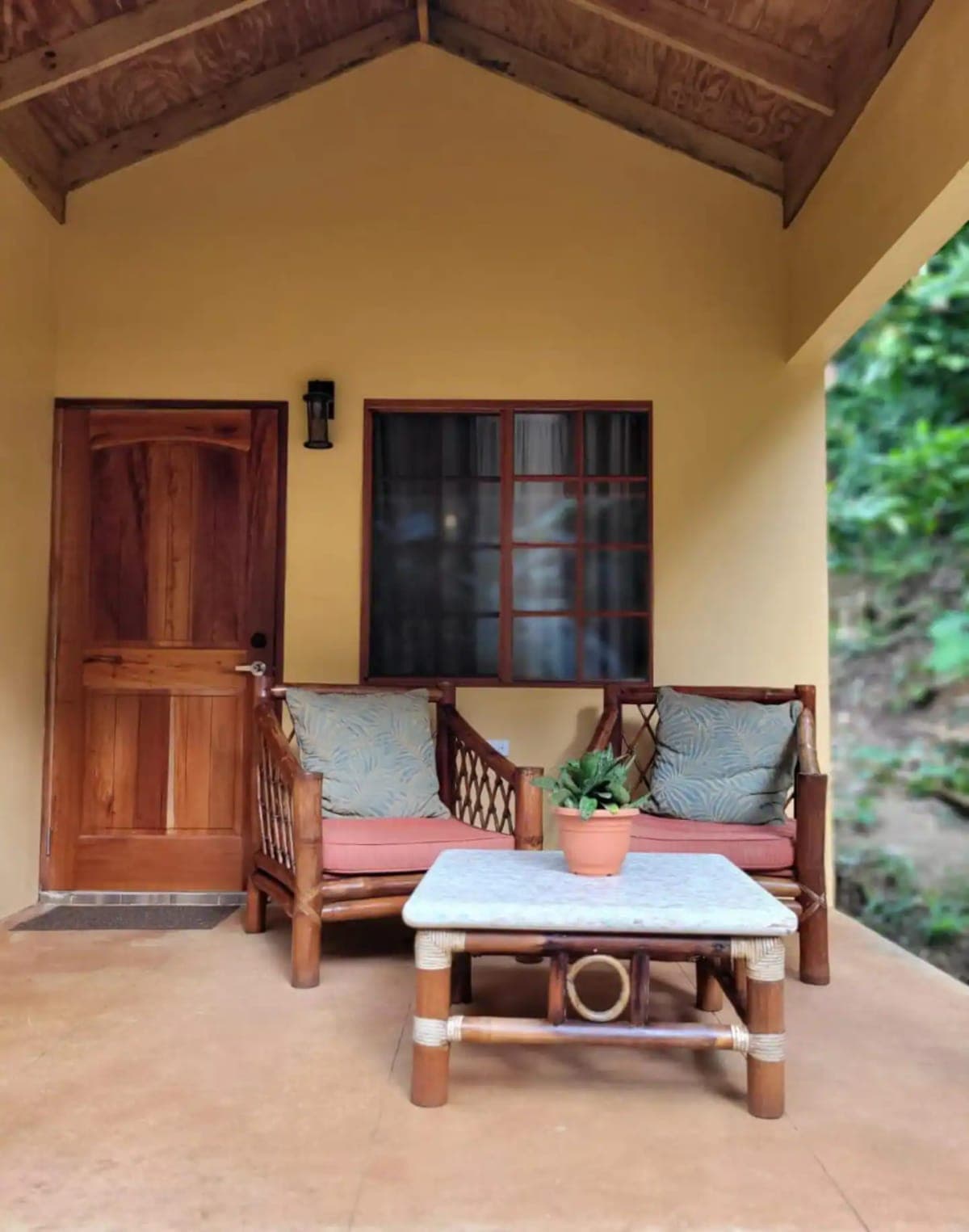 Covered veranda opening to the jungle